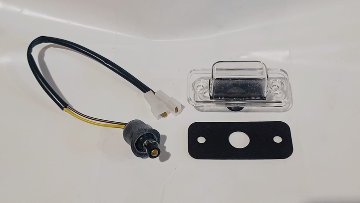 Faro matricula con porta lampara y terminales i/d - Imagen principal